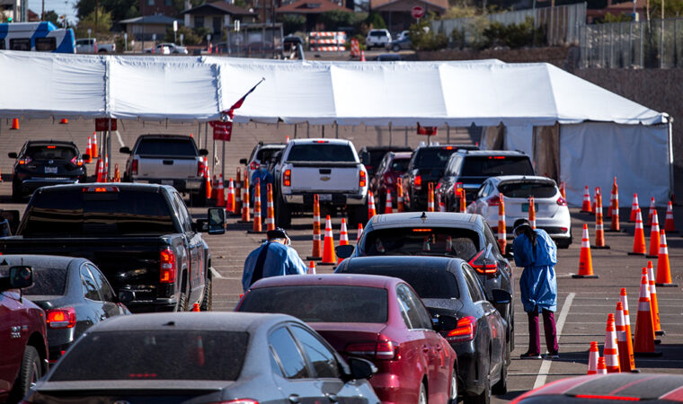 lines of cars lined up for COVID testing