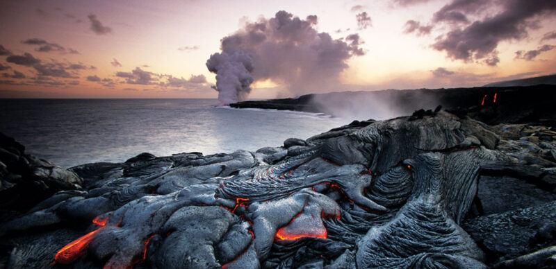 hot, orange lava on the edge of the sea