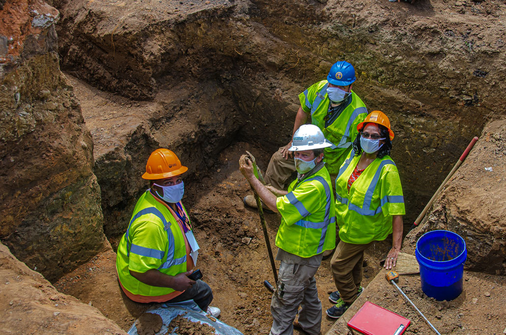 excavation team members in a trench at Oaklawn