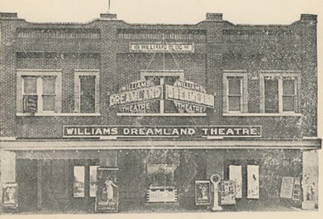 grainy black and white image of the exterior of the Dreamaland theater before the massacre