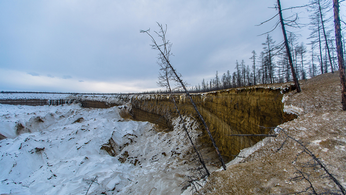 A photo of thawing permafrost created a crater.