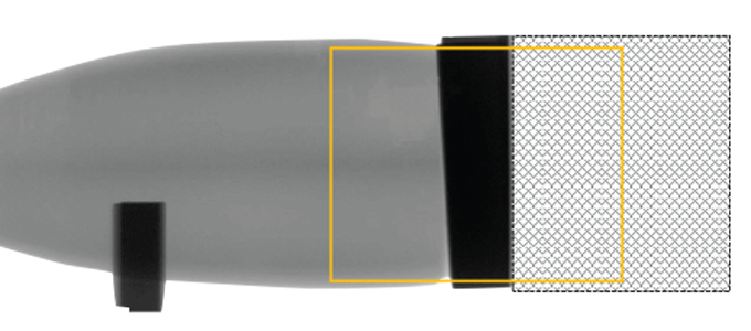 A x-ray image of a replica dagger-axe made from jade, stacks of brass plates and silk thread. A yellow outline surrounds a dark box of the replica that was neutron imaged.