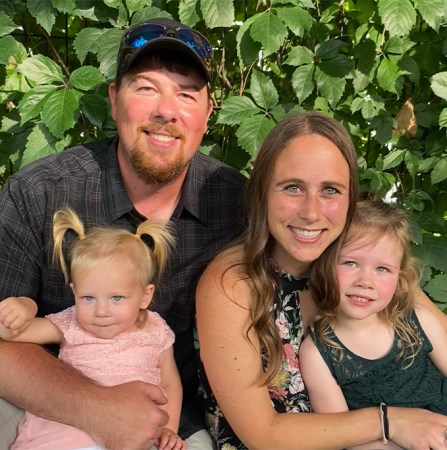 A picture of a family attending a wedding